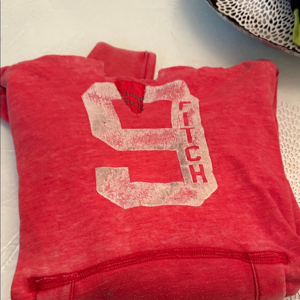 Abercrombie & Fitch men’s Red Number Hoodie. Strings for hoodie are missing.